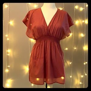 Burnt-orange peasant top